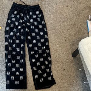 Black Lounge Pants with White Repeating Logo Print